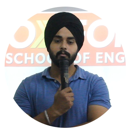 Sarpreet confidently presenting during an English speaking class at Oxford