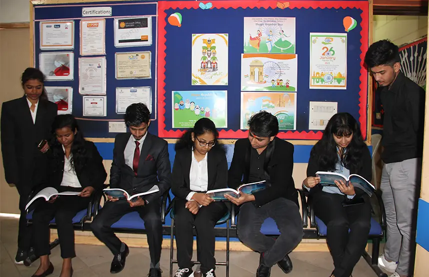 Students prepare confidently for a mock interview to improve spoken english