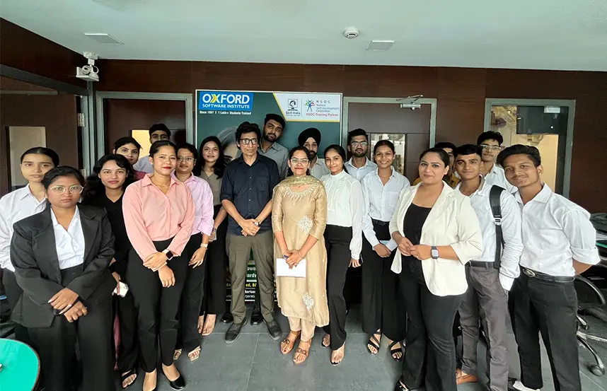 Students pose with trainers after a successful mock presentation